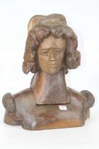 An oak head and shoulders bust of a lady, carved in two sections, h.46cm