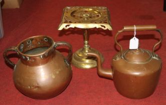 A Victorian copper range kettle, h.29cm; together with a copper twin handled urn; and a pierced