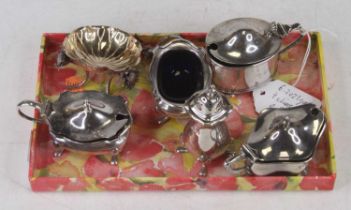 Assorted silver cruets to include three mustards, open table salt and pepperette, silver weight 6.