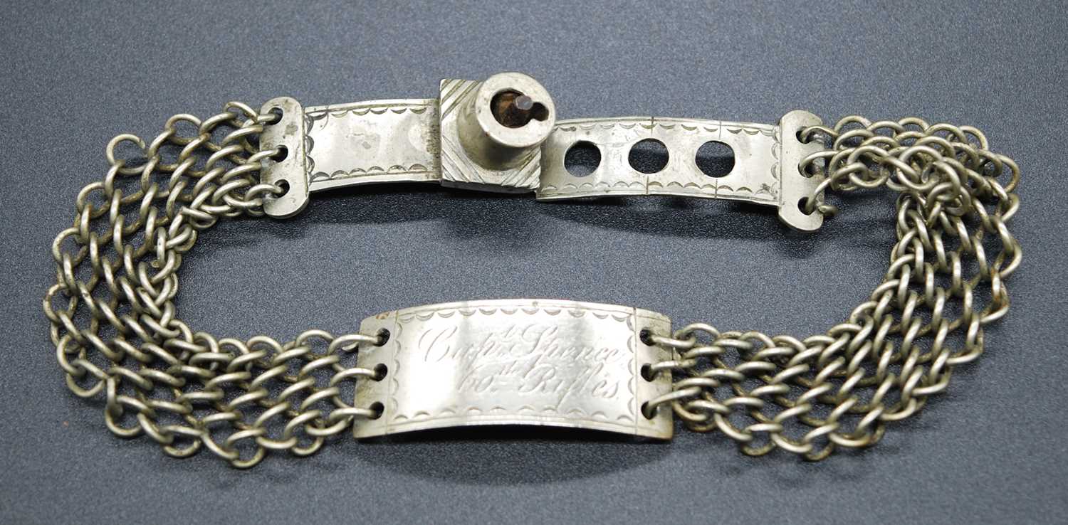 A 19th century identity bracelet, the central curved white metal disc engraved Capt. Spence 60th - Image 3 of 5