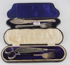 A late Victorian cased pair of silver bladed and silver on loaded handles fish servers, maker