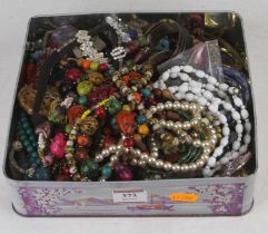 A collection of miscellaneous costume jewellery to include a pompadour simulated pearl two string