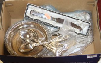 A collection of silver plated wares, to include Queens pattern tablespoons and bottle coasters