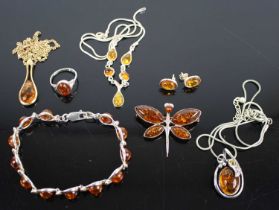 A 9ct gold clear amber set pendant on 9ct gold fine link neck chain, 8.1g, together with various