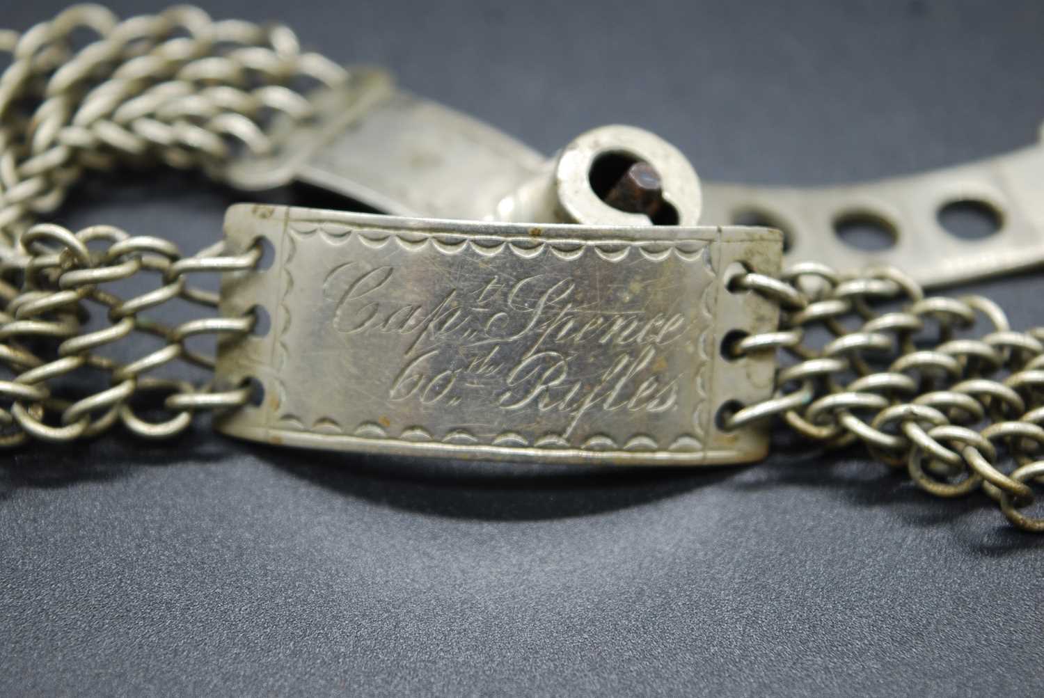 A 19th century identity bracelet, the central curved white metal disc engraved Capt. Spence 60th - Image 2 of 5