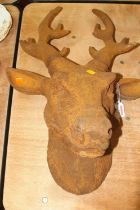 A rusted cast iron model of a stag's head, h.60cm