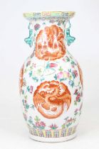 A Chinese porcelain vase, enamel decorated with phoenix, red enamel seal mark to the underside, h.