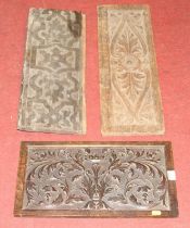 An antique carved oak architectural panel, 58 x 22cm; together with two others (3)