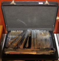 An SBS Bestecke gold plated canteen of cutlery, housed in faux leather combination locking case, w.