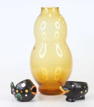 A 20th century amber glass vase, of double gourd form, h.33cm; together with a West German pottery