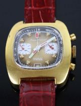 A 1970s Jean Decret gold plated and steel cased chronograph, manual wind movement, having a signed