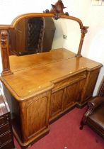 A mid-Victorian mahogany and flame mahogany round cornered mirror back sideboard, having four