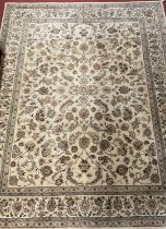 A Persian style woollen cream ground Tabriz rug, retailed by John Lewis, 298 x 238cm Some general