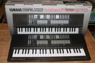 A boxed Yamaha Portesan PSS 570 keyboard