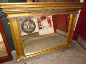 A large contemporary French style gilt framed bevelled over mantel mirror, in the classical taste,
