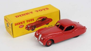 Dinky Toys No. 157 Jaguar XK 120 coupe comprising red body with red hubs, in the original correct