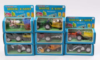A collection of eight various boxed Blue Box Home Farm Series farming equipment plastic