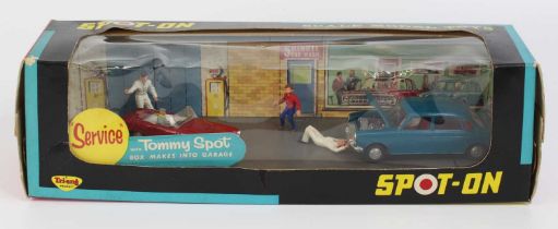 Spot-On No. 803 Superville Garage with Tommy Spot, containing 286 Austin 1800 in blue with red