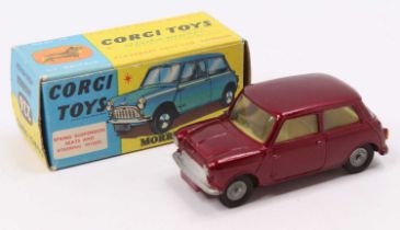 Corgi Toys No. 226 Morris Mini Minor comprising of metallic maroon body with lemon interior, and