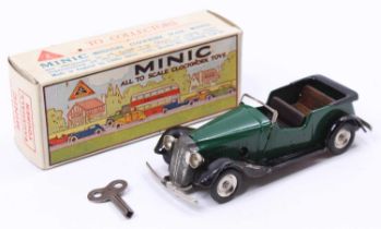 Triang Minic tinplate and clockwork No.17M Vauxhall Cabriolet, comprising a green body with a wooden