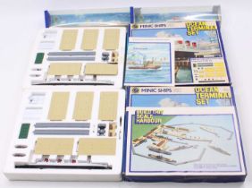 A collection of Triang Minic Ships comprising 2x No. M902 Ocean Terminal Set, both sets appear to be