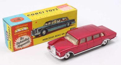 Corgi Toys No. 247 Mercedes Benz 600 Pullman comprising of metallic red body with cream interior and