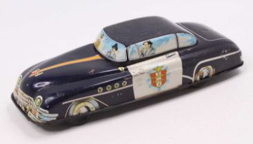A Welso Toys of Great Britain tinplate and friction drive model of a highway patrol police car,