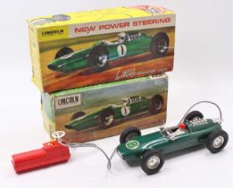 A Lincoln International plastic and battery operated model of a Lotus Indianapolis racing car