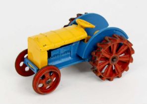 Dinky Toys pre-war No.22E farm tractor comprising of blue and yellow body with red wheels (VG)