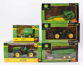 One box containing five various Britains John Deere related tractors and farm implements, to include