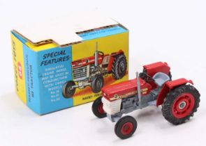 Corgi Toys No. 66 Massey Ferguson 165 tractor comprising of red and grey body with red hubs,