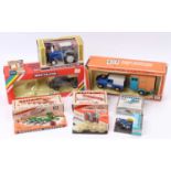 A collection of Britains Farming and Military models, with examples including No. 9524 Ford 6600