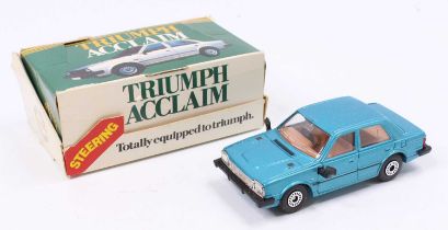 A Corgi Toys promotional Triumph Acclaim dealer display model, comprising of a metallic blue body
