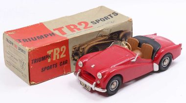 Victory Industries 1/18th scale plastic model of a Triumph TR2 Sports Car, red body, with brown