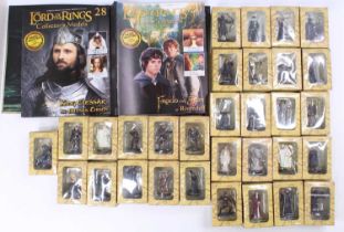 One tray containing a quantity of boxed Lord of the Rings New Lines Cinema release lead figures, the