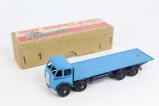 Dinky Toys No. 502 Foden flat truck comprising of first type light blue cab and back with dark