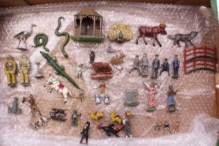 A collection of unusual and scarce vintage lead figures to include a Pixyland Kew peacock, a Jo Hill