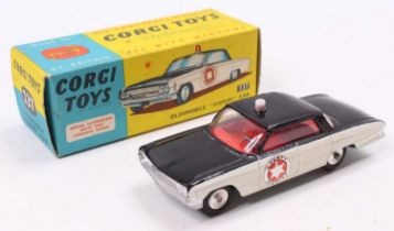 Corgi Toys No. 237 Oldsmobile Sheriff car, comprising of black & white body with red interior with