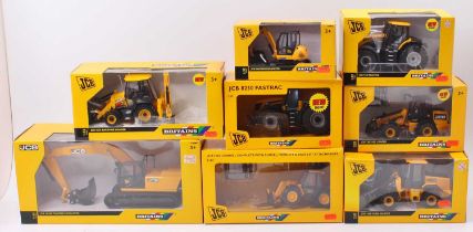 Collection of JCB Britains diecast vehicles, all housed in original window boxes, some used others