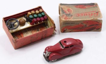 Schuco Germany No.3000 Telesteering Car comprising of 4-speed car with red tinplate body, 12