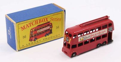 Matchbox Lesney No. 56 Trolleybus, red body, with black plastic wheels, and 'Peardrax' decals,