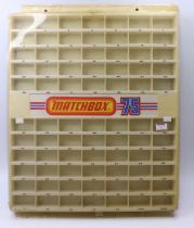 A Matchbox Lesney 1970's plastic retailers shop display, with 77 individual model display