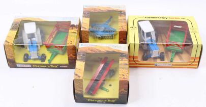 Lone Star Farmers Boy Series boxed group of 4 comprising 2x No. 1702 Tractor and Hay Cart, No.