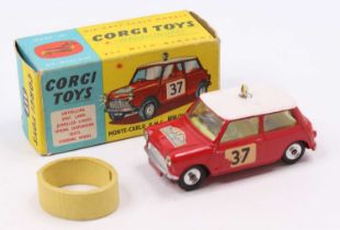 Corgi Toys No.317 B.M.C Mini Cooper with red body and white roof, fitted with yellow interior,