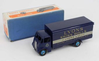 Dinky Toys, 514 Lyons Guy van, dark blue first type cab, chassis and back, mid-blue rigid hubs,