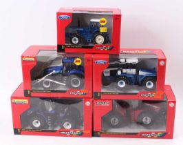 A collection of Britains 1/32 scale boxed tractors to include a Case IH 600 four-wheel drive Stiga