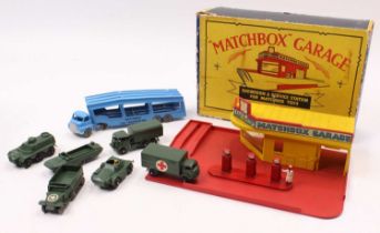 A Matchbox Lesney MG1 Garage and Showroom in the usual specification of yellow and red, with a set