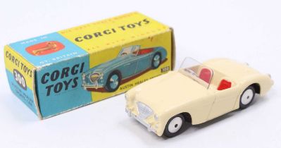 Corgi Toys No. 300 Austin Healey sports car, comprising of cream body with red seats and windscreen,