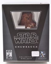 A Gentle Giant Ltd 1/6 scale model of a Star Wars Chewbacca collectable mini bust, housed in the
