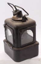 A railway interest four aspect oil hand lamp, marked 5/4 on plaque to top, with later plastic